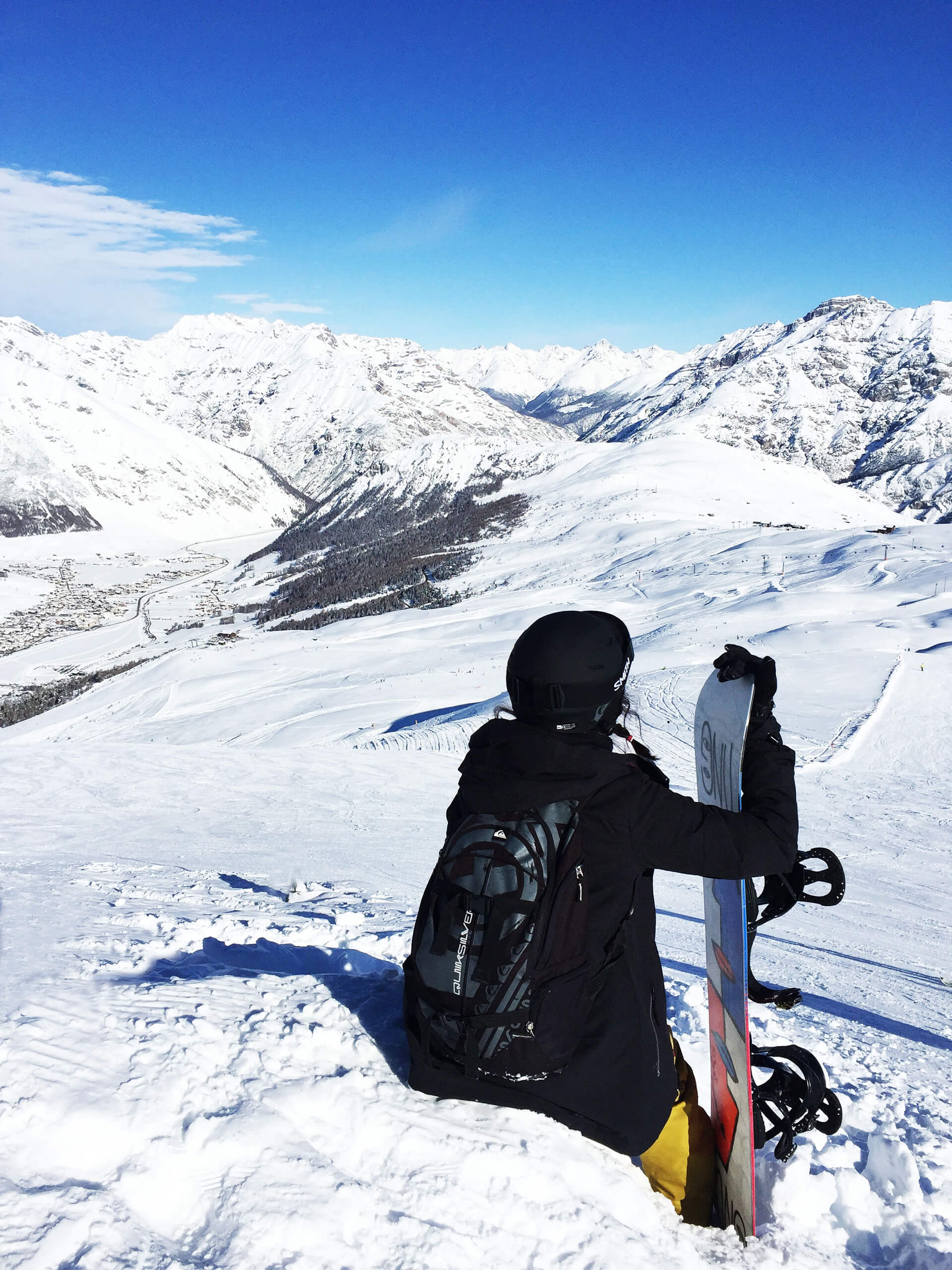 Na snowboard do Livigna