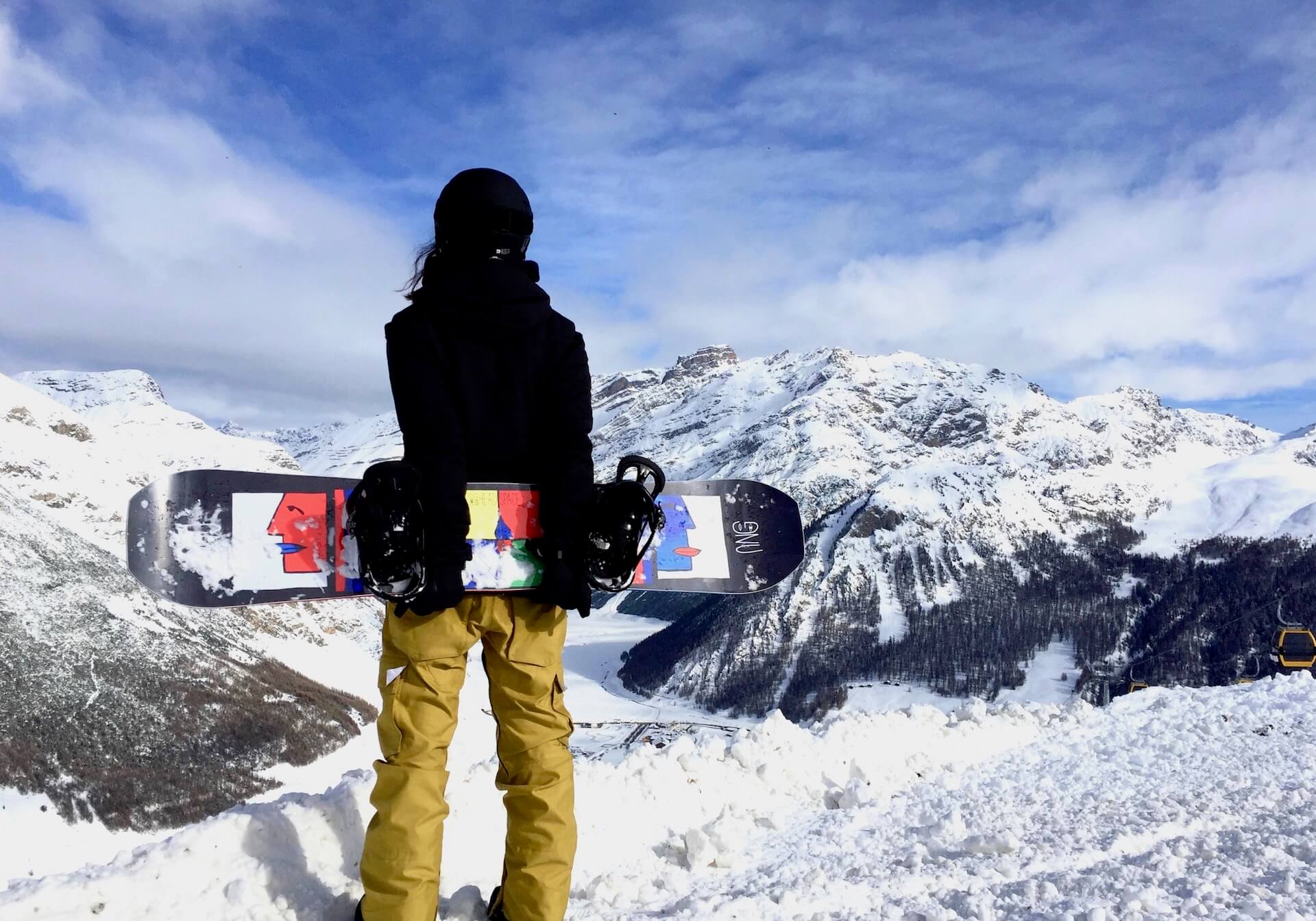 Na snowboard do Livigna
